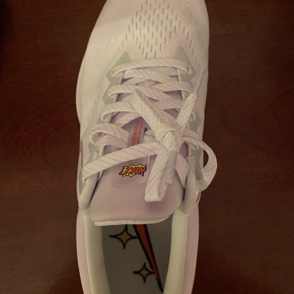 pink and white nike zooms